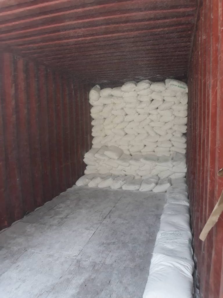 Bags of Gypsum inside container